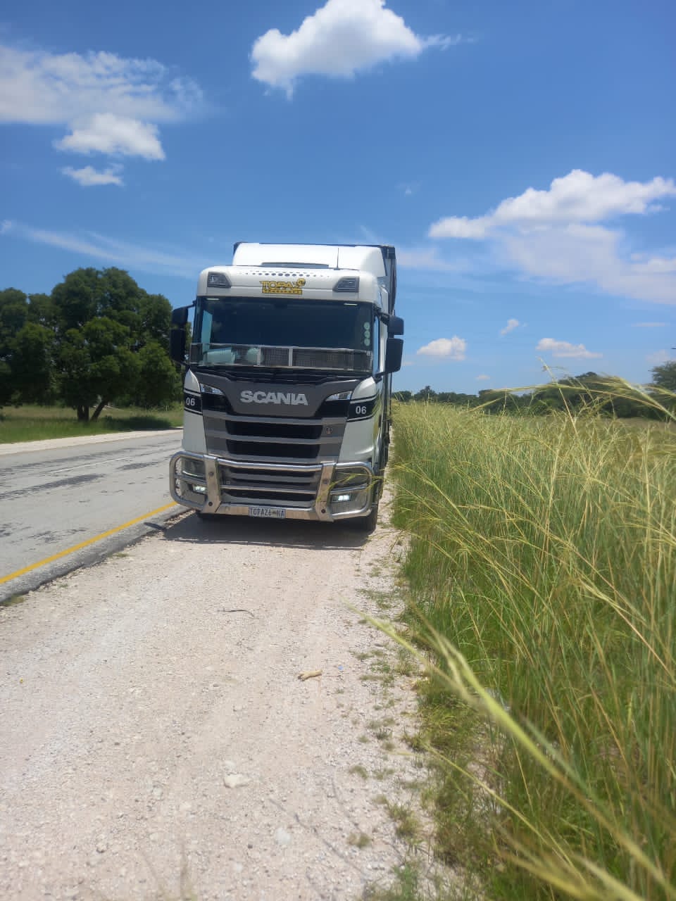 Topaz Transport Scania parked on the roadside during a scheduled run