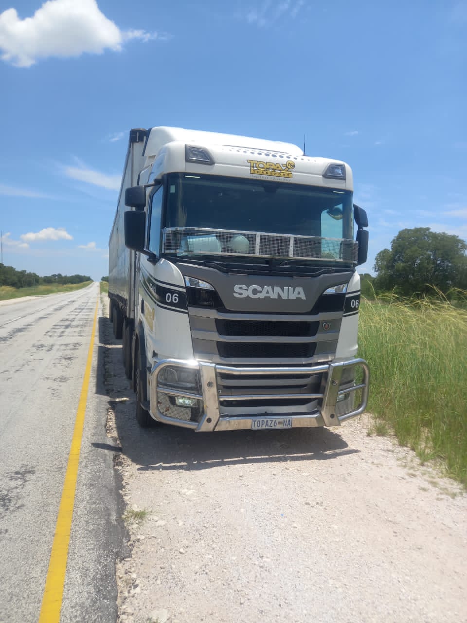 Scania TOPAZ 06 parked on the roadside of a Namibian highway